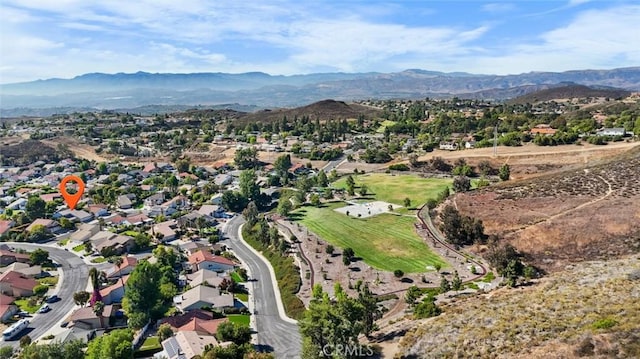 1317 Mill Creek Ct, Thousand Oaks, CA 91360 - aerial overview of property's location with a mountain backdrop and nearby suburban area