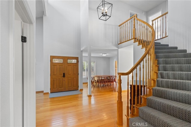 1317 Mill Creek Ct, Thousand Oaks, CA 91360 - entrance foyer featuring a towering ceiling, light wood finished floors, stairs, and a chandelier