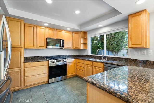 1317 Mill Creek Ct, Thousand Oaks, CA 91360 - kitchen featuring appliances with stainless steel finishes, a tray ceiling, recessed lighting, dark stone counters, and open shelves