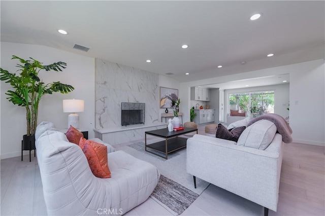 16645 Holton St, La Puente, CA 91744 - living room with recessed lighting and a high end fireplace