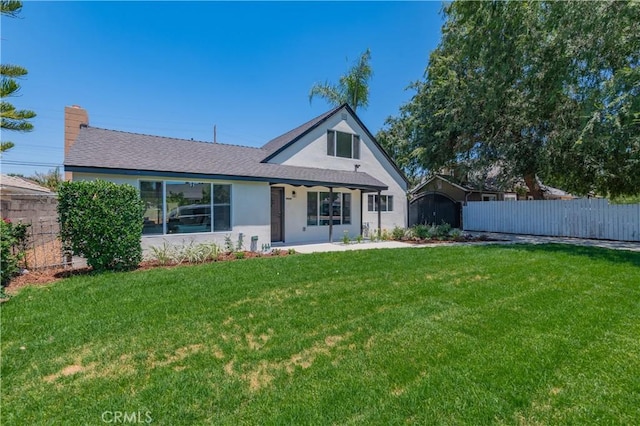 16645 Holton St, La Puente, CA 91744 - view of front of home with stucco siding, a shingled roof, and a chimney