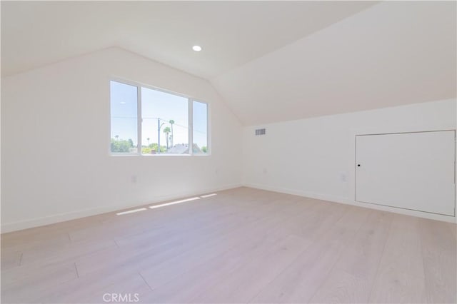 16645 Holton St, La Puente, CA 91744 - additional living space with vaulted ceiling, light wood-style floors, and recessed lighting