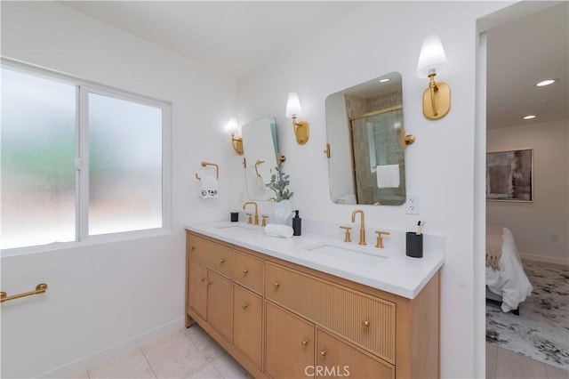 16645 Holton St, La Puente, CA 91744 - full bath featuring plenty of natural light, double vanity, tile patterned flooring, connected bathroom, and recessed lighting