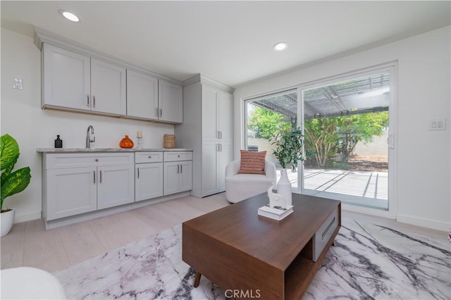16645 Holton St, La Puente, CA 91744 - living area with light wood-style flooring and recessed lighting