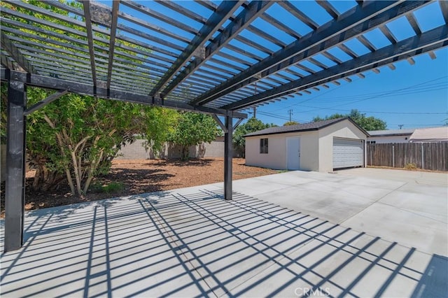 16645 Holton St, La Puente, CA 91744 - view of patio / terrace featuring an outdoor structure and a garage