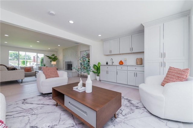 16645 Holton St, La Puente, CA 91744 - living area with recessed lighting and a fireplace