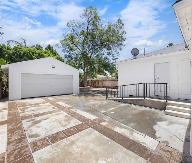 6846 Wystone Ave, Reseda, CA 91335 - view of patio featuring a garage and an outdoor structure