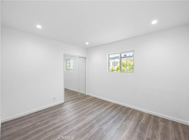 6846 Wystone Ave, Reseda, CA 91335 - spare room with recessed lighting and wood finished floors