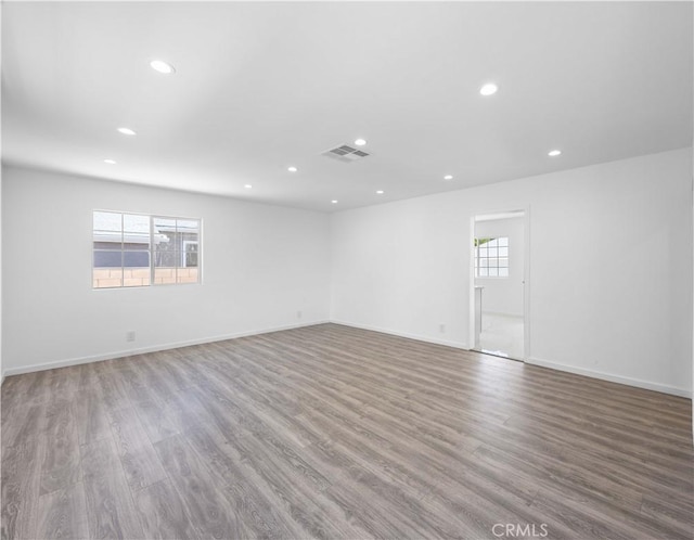 6846 Wystone Ave, Reseda, CA 91335 - spare room featuring wood finished floors and recessed lighting