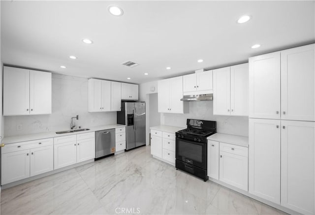 6846 Wystone Ave, Reseda, CA 91335 - kitchen featuring appliances with stainless steel finishes, recessed lighting, light countertops, under cabinet range hood, and white cabinets