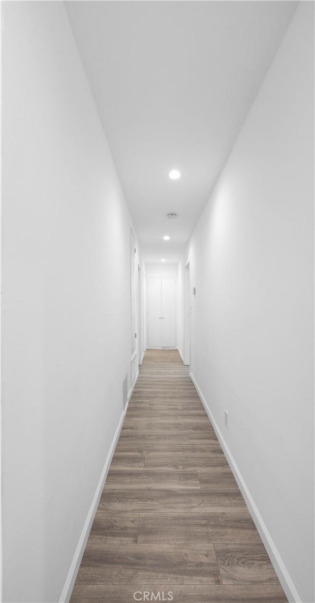 6846 Wystone Ave, Reseda, CA 91335 - corridor featuring recessed lighting and wood finished floors