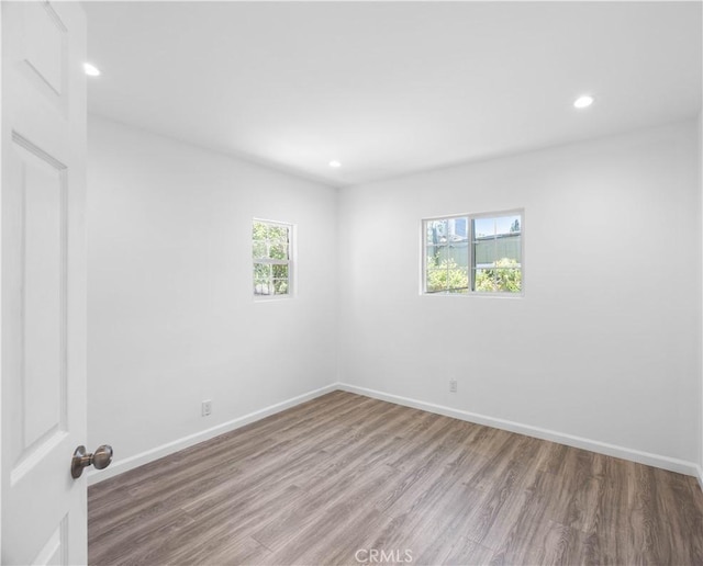 6846 Wystone Ave, Reseda, CA 91335 - unfurnished room with wood finished floors and recessed lighting