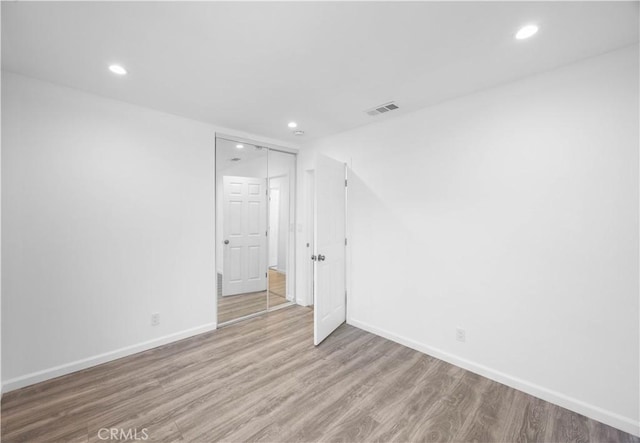 6846 Wystone Ave, Reseda, CA 91335 - unfurnished room with recessed lighting, wood finished floors, and lofted ceiling