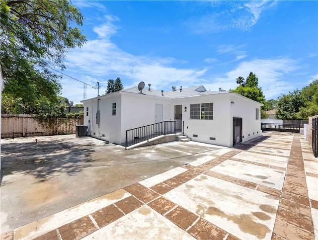 6846 Wystone Ave, Reseda, CA 91335 - rear view of house with a patio and stucco siding