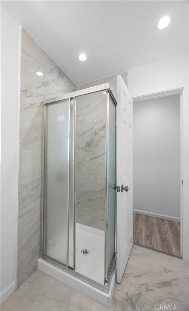 6846 Wystone Ave, Reseda, CA 91335 - full bath featuring a shower stall, recessed lighting, and marble look tiles