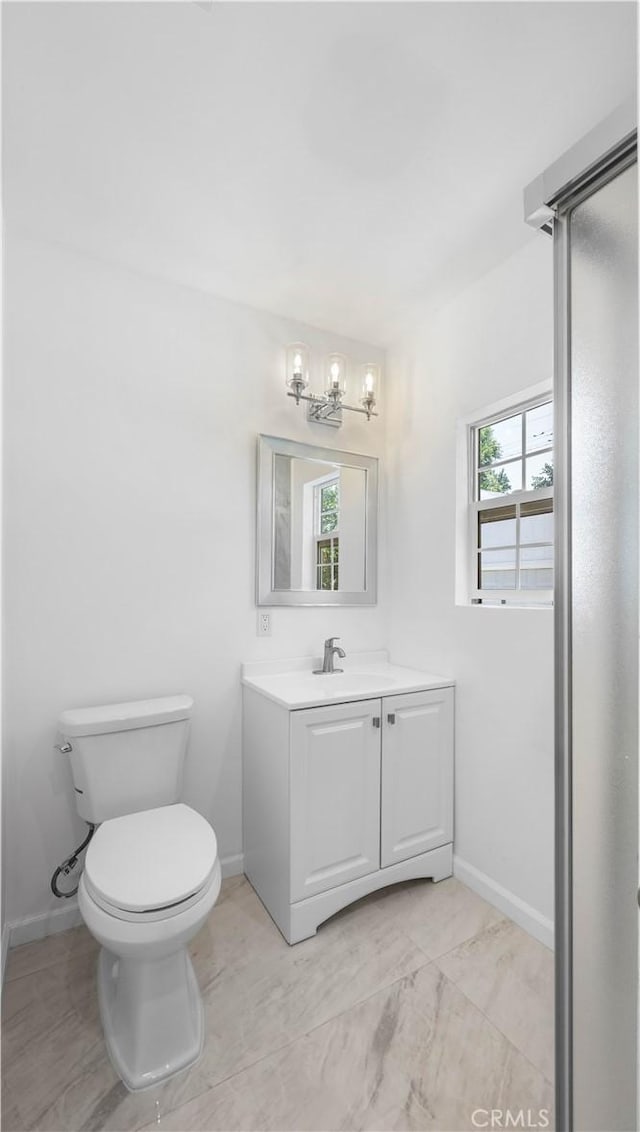 6846 Wystone Ave, Reseda, CA 91335 - bathroom featuring vanity, a chandelier, and marble finish flooring