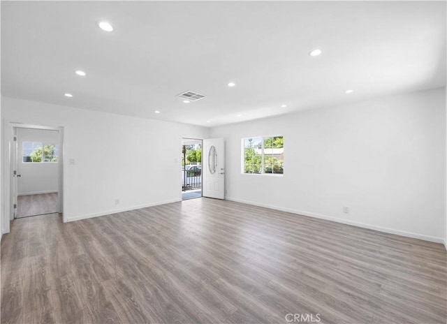 6846 Wystone Ave, Reseda, CA 91335 - spare room featuring recessed lighting and wood finished floors