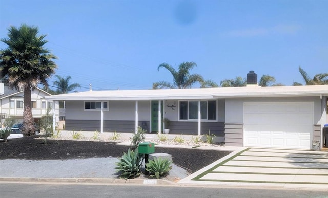 1710 Valley Pl, Carlsbad, CA 92008 - ranch-style house featuring an attached garage, a chimney, and concrete driveway