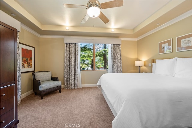 2727 Shell Beach Rd Unit 219, Pismo Beach, CA 93449 - bedroom featuring a tray ceiling, light carpet, and ceiling fan
