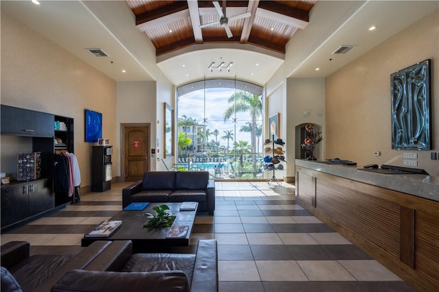 2727 Shell Beach Rd Unit 219, Pismo Beach, CA 93449 - living area featuring high vaulted ceiling, a wooden ceiling with exposed beams, tile patterned floors, and recessed lighting