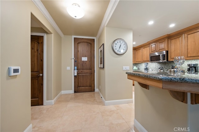 2727 Shell Beach Rd Unit 219, Pismo Beach, CA 93449 - foyer entrance with baseboards and light tile patterned flooring