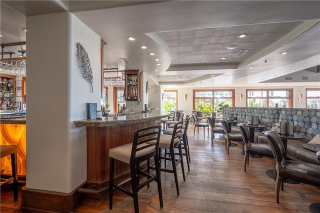 2727 Shell Beach Rd Unit 219, Pismo Beach, CA 93449 - indoor wet bar featuring a raised ceiling, wood-type flooring, and recessed lighting