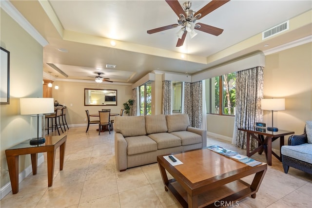 2727 Shell Beach Rd Unit 219, Pismo Beach, CA 93449 - living room featuring a tray ceiling, a ceiling fan, and light tile patterned flooring