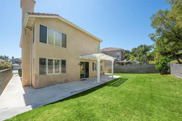 25623 Frost Ln, Stevenson Ranch, CA 91381 - back of house featuring a pergola, a fenced backyard, a patio, and stucco siding