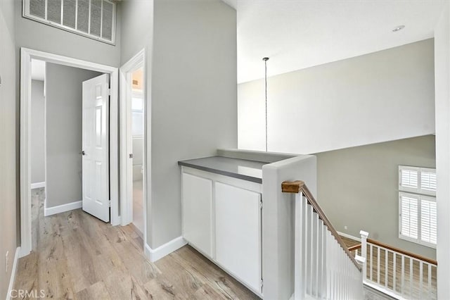 25623 Frost Ln, Stevenson Ranch, CA 91381 - hall featuring an upstairs landing and light wood finished floors