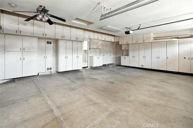 25623 Frost Ln, Stevenson Ranch, CA 91381 - garage with a garage door opener and ceiling fan