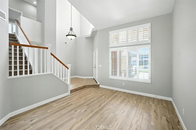 25623 Frost Ln, Stevenson Ranch, CA 91381 - foyer entrance with stairs and wood finished floors
