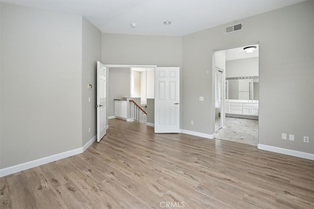 25623 Frost Ln, Stevenson Ranch, CA 91381 - unfurnished bedroom with light wood finished floors and ensuite bath