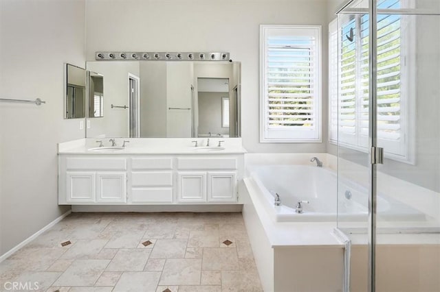 25623 Frost Ln, Stevenson Ranch, CA 91381 - bathroom featuring double vanity and a bath