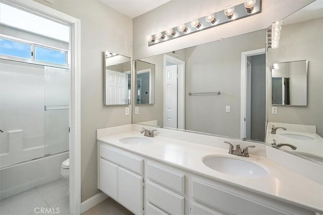 25623 Frost Ln, Stevenson Ranch, CA 91381 - bathroom with double vanity, shower / bath combination with glass door, and tile patterned floors
