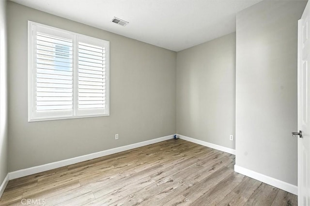 25623 Frost Ln, Stevenson Ranch, CA 91381 - spare room featuring wood finished floors and baseboards