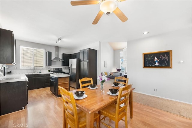 2659 Cold Creek Ave, Rosamond, CA 93560 - dining area featuring light wood-style flooring, ceiling fan, and recessed lighting