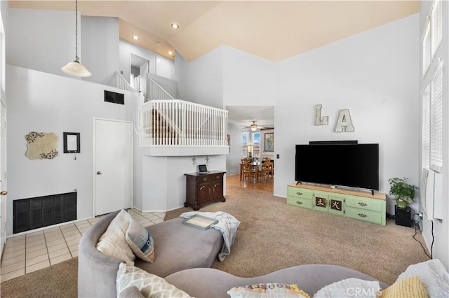 2659 Cold Creek Ave, Rosamond, CA 93560 - living area with high vaulted ceiling, ceiling fan, carpet flooring, tile patterned flooring, and recessed lighting
