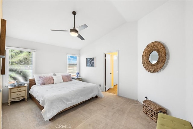 2659 Cold Creek Ave, Rosamond, CA 93560 - bedroom with lofted ceiling, multiple windows, light carpet, and a ceiling fan