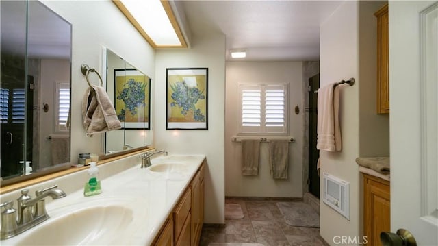 8920 Del Monte Ave, Yucca Valley, CA 92284 - bathroom featuring a shower stall and double vanity