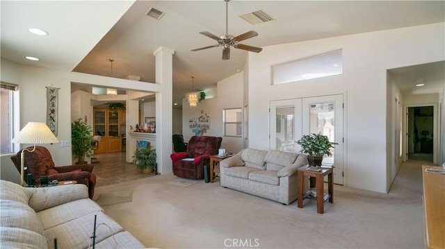 8920 Del Monte Ave, Yucca Valley, CA 92284 - living area featuring light carpet, french doors, ceiling fan, high vaulted ceiling, and recessed lighting