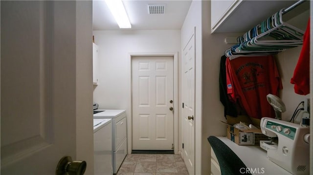8920 Del Monte Ave, Yucca Valley, CA 92284 - laundry area featuring washing machine and dryer and cabinet space