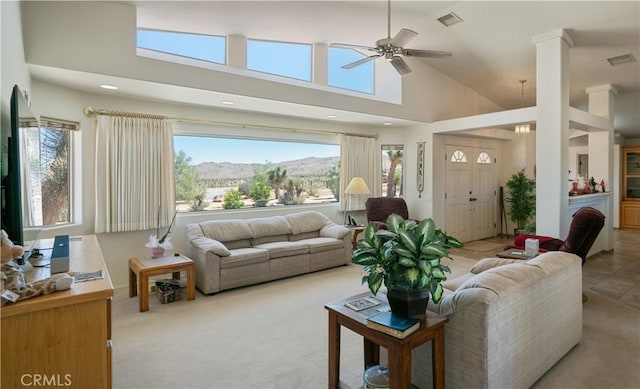 8920 Del Monte Ave, Yucca Valley, CA 92284 - carpeted living area featuring ceiling fan, healthy amount of natural light, high vaulted ceiling, and recessed lighting