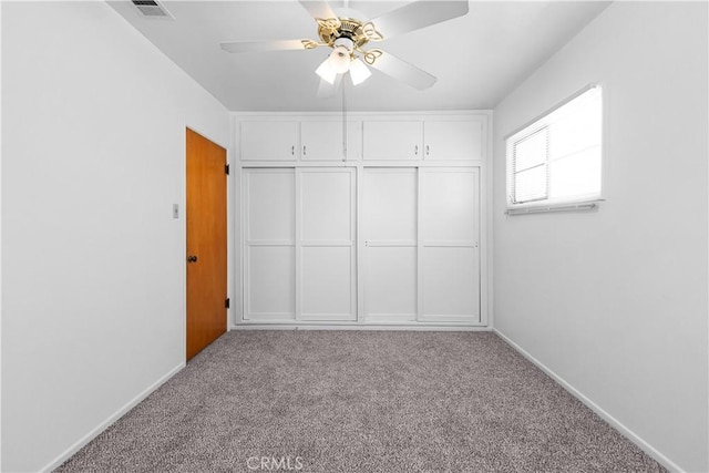 1256 Windsor Dr, San Bernardino, CA 92404 - unfurnished bedroom featuring carpet and ceiling fan