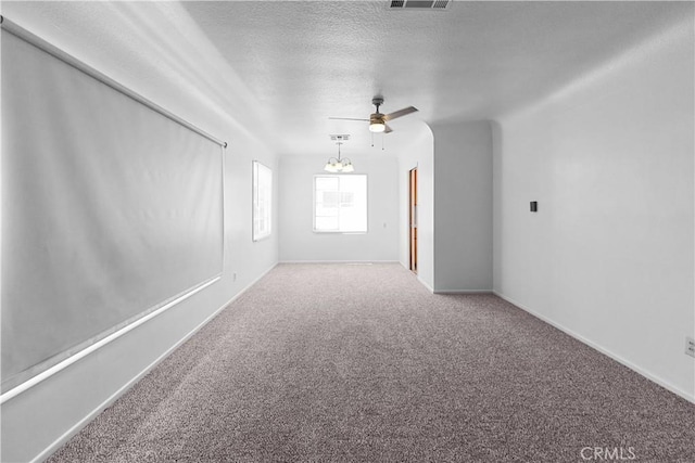 1256 Windsor Dr, San Bernardino, CA 92404 - carpeted empty room featuring a ceiling fan, a textured ceiling, and a chandelier