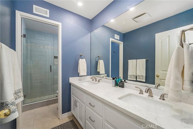 2151 Lyon Ave, Riverside, CA 92503 - bathroom with double vanity, a stall shower, tile patterned floors, and recessed lighting