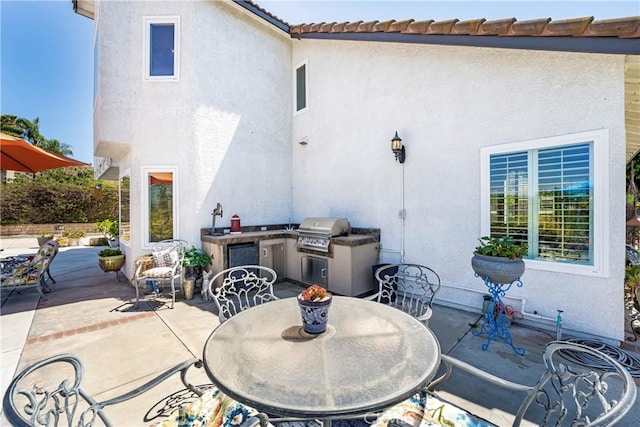 2151 Lyon Ave, Riverside, CA 92503 - view of patio with exterior kitchen and outdoor dining space