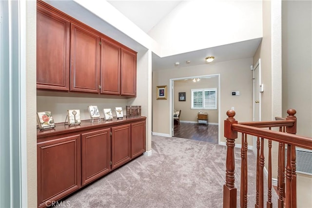 2151 Lyon Ave, Riverside, CA 92503 - bar featuring light colored carpet and vaulted ceiling