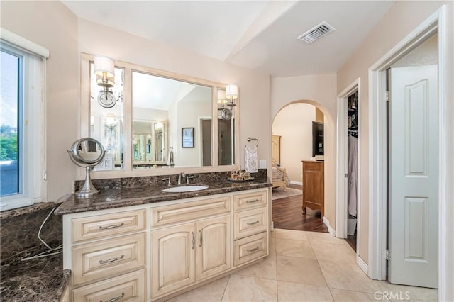 2151 Lyon Ave, Riverside, CA 92503 - full bath featuring vanity, a walk in closet, and lofted ceiling