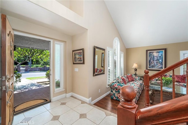2151 Lyon Ave, Riverside, CA 92503 - foyer entrance featuring plenty of natural light, high vaulted ceiling, and light tile patterned floors