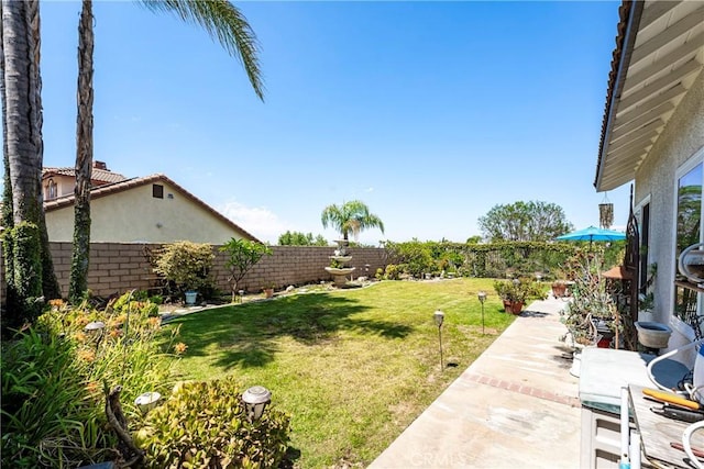 2151 Lyon Ave, Riverside, CA 92503 - fenced backyard with a patio